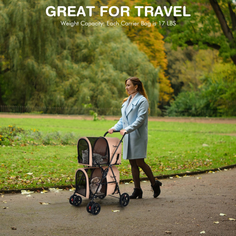 Beige double cat stroller with 360 degree front wheels and lockable rear wheels