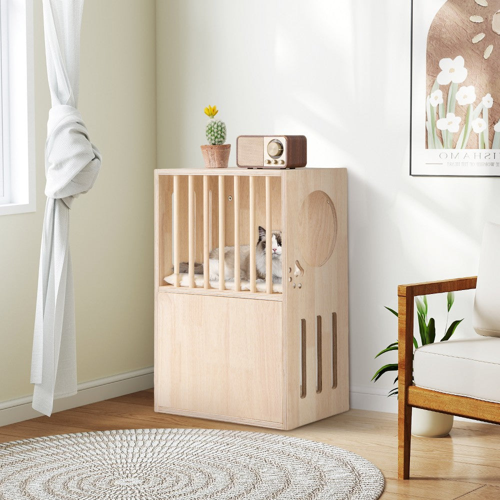 Natural and white wooden cat house used as a side table